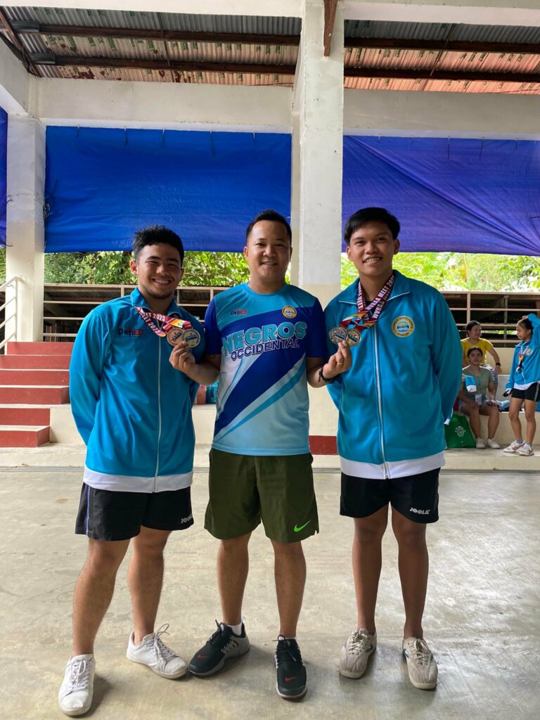 Celebrating victory. From left to right. Raul Mallen III, Stephen Andrew Timson, and Dirk Atilano. | Photo by Stephen Andrew Timson.