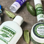 Herbal wellness products with green leaves.