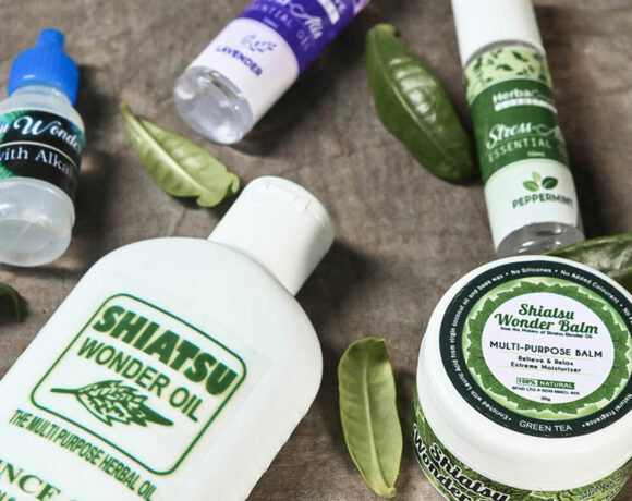 Herbal wellness products with green leaves.